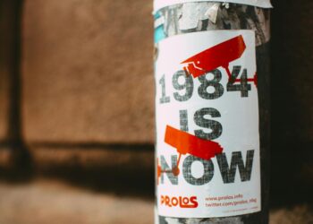 1984 Is Now Prolos bottle on brown surface