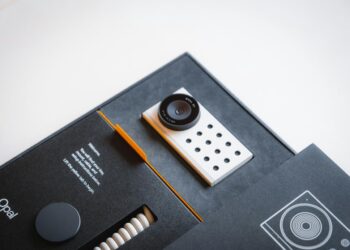 a camera sitting on top of a black box